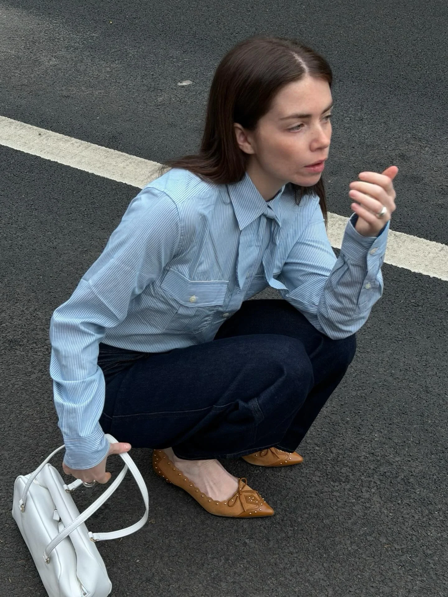 Cute new @jcrew top! I love the little neck tie detail that adds a little something more to a classic striped button down.