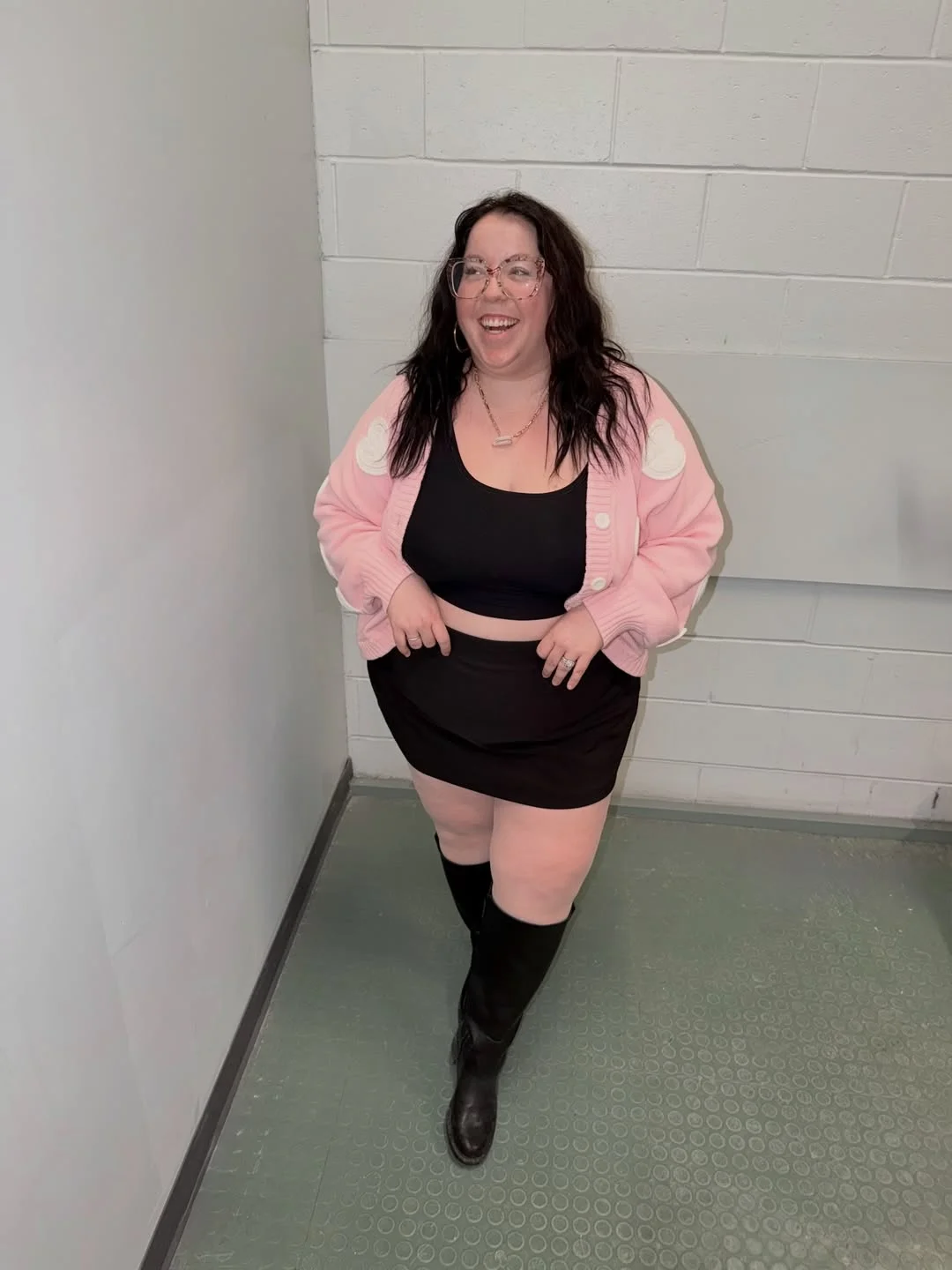 sweater: @auntiepretty x @smashtess boots: @dolcevita skort: @torrid earrings: @houseofmoda