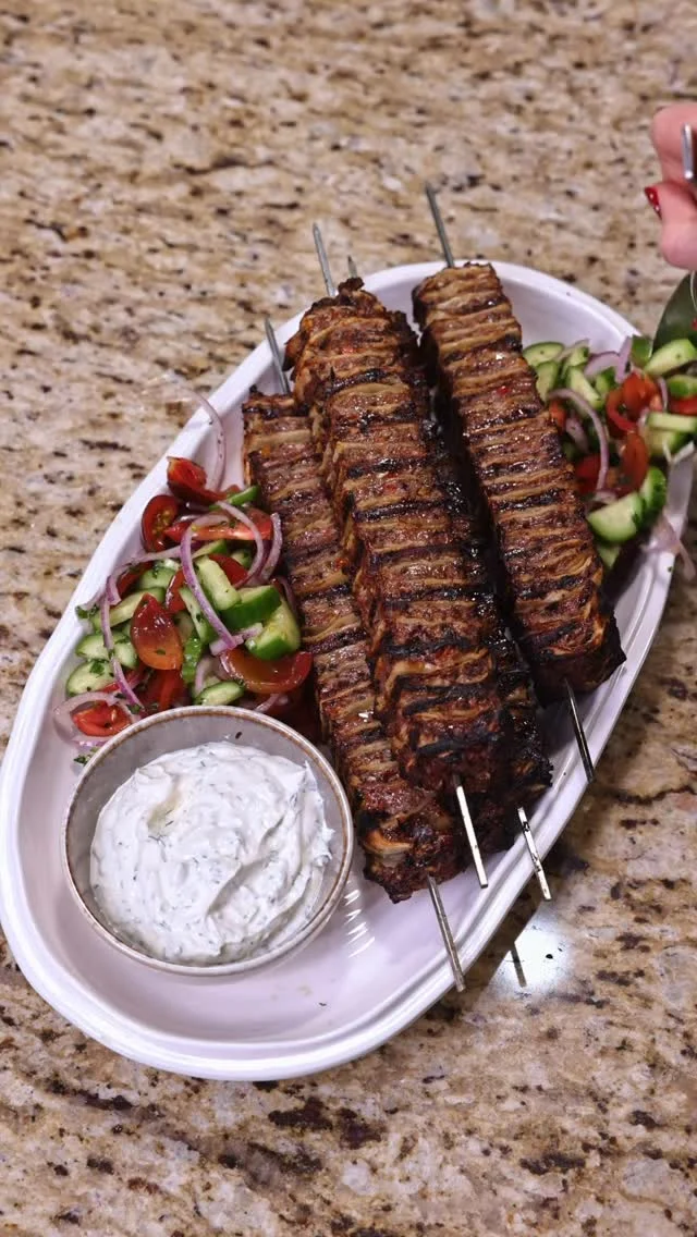 Lamb Kabob Tortilla Skewers
Kabob Ingredients
	•	2 lb ground lamb
	•	6 large flour tortillas (trimmed into squares)
	•	1 red bell pepper, finely chopped
	•	1 small red onion, finely chopped
	•	4 garlic cloves, minced
	•	1/3 cup parsley, chopped
	•	2 tbsp paprika, 1 tbsp cumin, 1 tbsp garlic powder, 1 tbsp oregano
	•	1 tbsp black pepper, 1 tbsp salt
Sauce
	•	2 tbsp Greek yogurt + 2 tbsp mayo
	•	1 tsp tahini
	•	2 garlic cloves, grated
	•	Salt + paprika to taste
Salad
	•	4-5 tomatoes
	•	1/2 red onion
	•	2 cucumbers 
	•	Parsley, pinch of salt
	•	1 tbsp olive oil + 1 tsp lemon juice