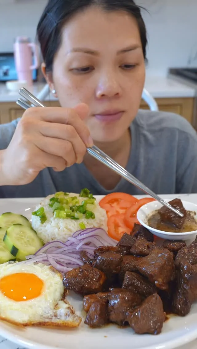 BO LUC LAC – Vietnamese Shaking Beef

INGREDIENTS
1 lb beef*
1 TBSP oil
1 ½ TBSP oyster sauce
2 TBSP soy sauce (low sodium preferred)
1 tsp sweetener of choice*
1 TBSP minced garlic
1 tsp black pepper
1 TBSP unsalted butter
Oil, for cooking
*in my video, I am using NY strip but I prefer ribeye
*use any sweetener of choice. I am using coconut sugar. Monkfruit sweetener or granulated white sugar works great too!

INSTRUCTIONS
1. Cut beef into 1 inch cubes.

2. Marinate with: 1 ½ TBSP oyster sauce, 2 TBSP low sodium soy sauce, 1 tsp sugar, 1 TBSP minced garlic and 1 tsp black pepper. Marinate for at least 10 minutes. If marinating for 10 minutes, marinate at room temp. 

3. In a wok/ skillet, heat up some oil. Once oil is HOT, add beef, give it a quick mix and then create an even base/ layer of your beef and leave to cook untouched for 1 minute. After 1 minute, give it a “shake” / mix so the other side of your beef can cook untouched for another minute.

4. After you are done cooking your beef, add in 1 TBSP of unsalted and cook until butter is melt. 

5. Serve with preferred rice, noodles and/ or preferred veggies. I like to serve with cucumbers, tomatoes, thinly sliced purple onion, a sunny side up egg, scallion oil and a salt/pepper/ lime dip.

Note: remember not to over crowd your pan. Doing do will decrease temp and your beef will not have a char/ crust on beef. Cook in 1 batch if you must