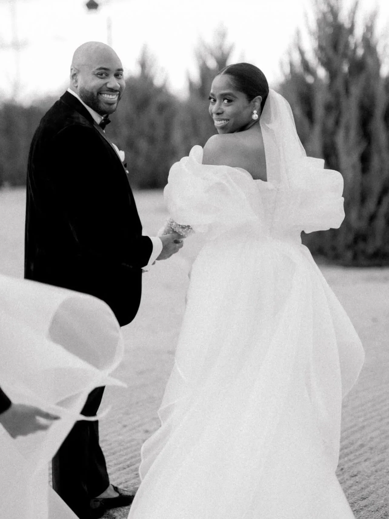 SHANON | A dress that frames her beauty with timeless sophistication, delicate detailing, and a silhouette that feels both regal and effortlessly romantic! - Join us at our London Sip & Say Yes to start your experience...