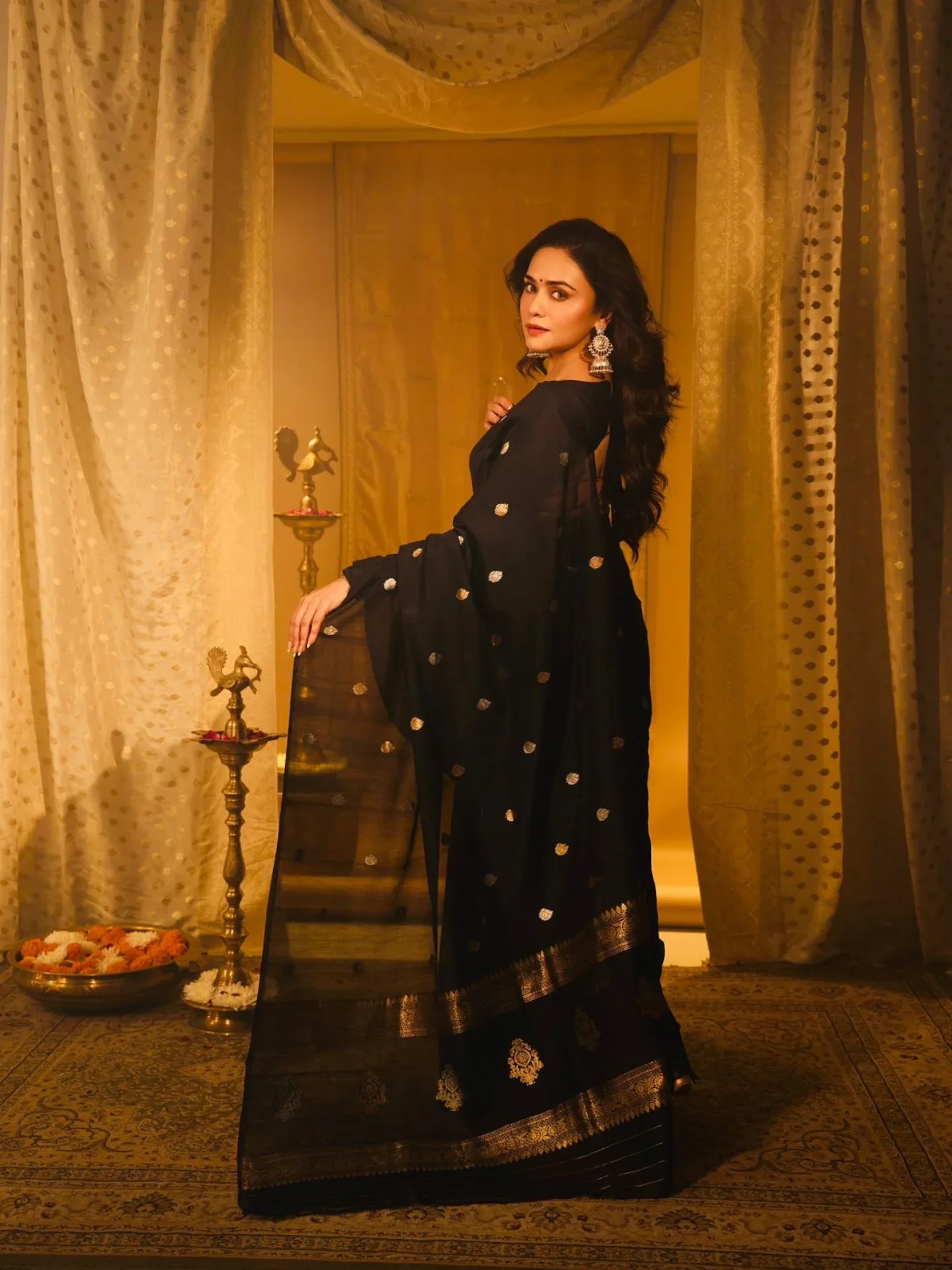 Shadows and Gold. 🖤⭐

✨KALIKA | SILK COTTON SAREE | COLLECTION OF LAVANYA 

✨STHIRA INTENSE BLACK | BLOUSE COLLECTION 

Tap the image to see pricing and details.🛍️

🌐
Saree Link: 
https://www.amulyabyamruta.in/products/jet-black-silk-cotton-saree

Blouse Link: 
https://www.amulyabyamruta.in/products/intense-black-full-sleeves

#amulya #amrutakhanvilkar #BlackSaree  #IndianFashion