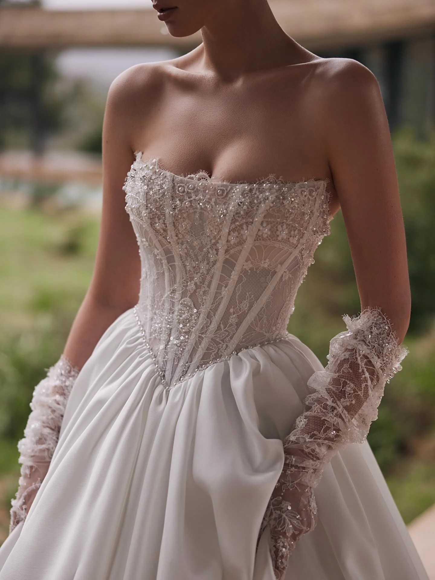 A modern romantic moment we can’t stop thinking about Aimee by @evalendel is elegance with an edge. Crafted with intricate handmade lace and a sculpted, figure-enhancing silhouette, this gown is stunning on its own - bu...